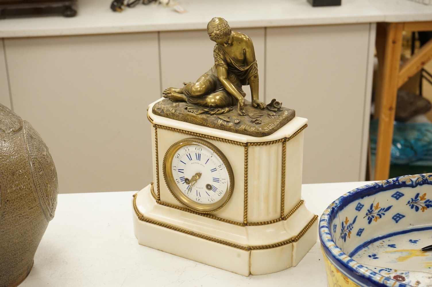A late 19th century French bronze figural mounted marble mantel clock, 34cm